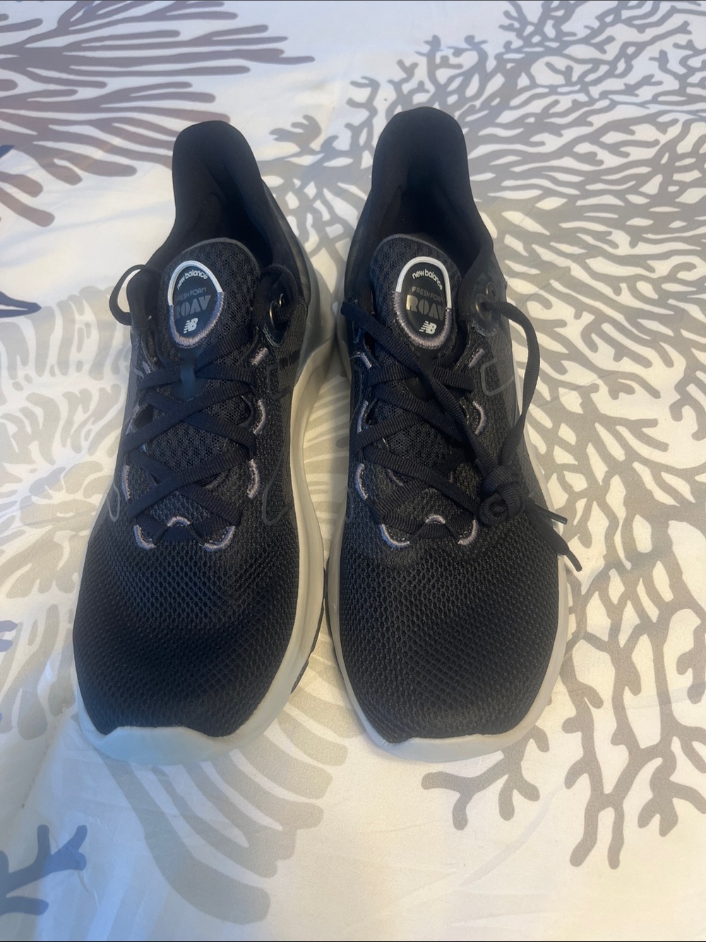 New Balance Black Athletic Running Shoes with White Soles